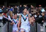 Port Adelaide captain Connor Rozee (centre) is a certain starter against Adelaide. (James Ross/AAP PHOTOS)