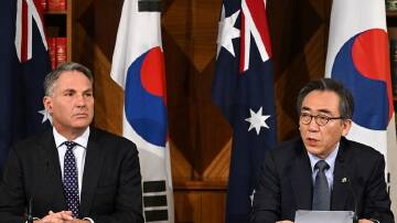 Australia and South Korea will work to block North Korea's access to funding for nuclear missiles. (Joel Carrett/AAP PHOTOS)