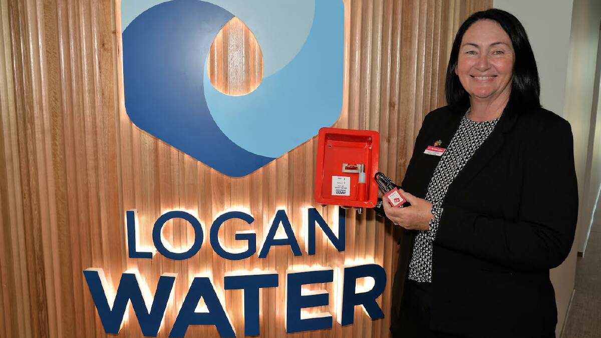 Infrastructure Chair Councillor Teresa Lane with the valve lock invented by Logan Water. Picture by Logan City Council.