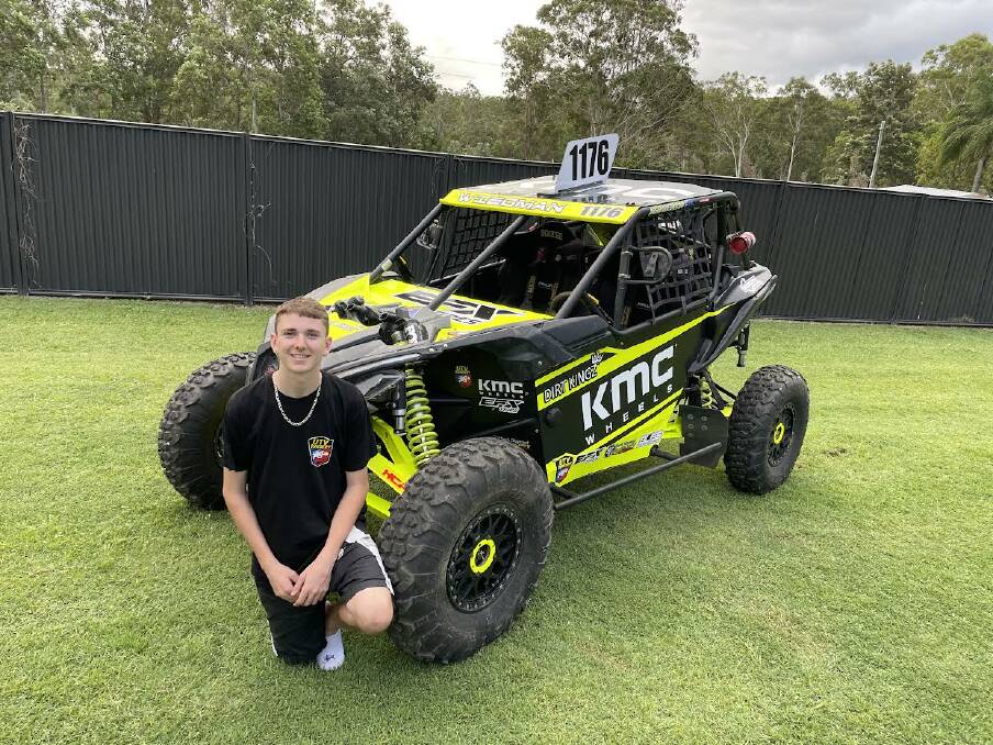 REVHEAD: Joshua Wiedman and the buggy that will carry him to the finish line in this year's Finke Desert Race. Picture: Paul Wiedman.