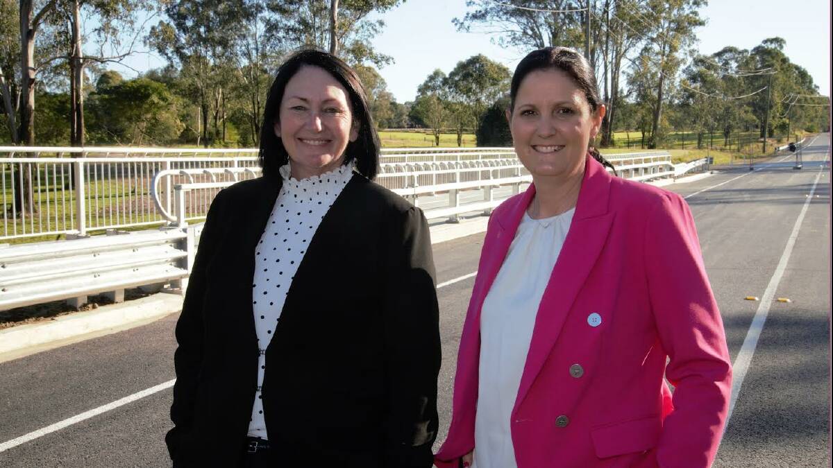 BRIDGING THE GAP: Infrastructure Chair Cr Teresa Lane (left) and Deputy Mayor Natalie Willcocks inspect the new bridge. Picture: Logan City Council.