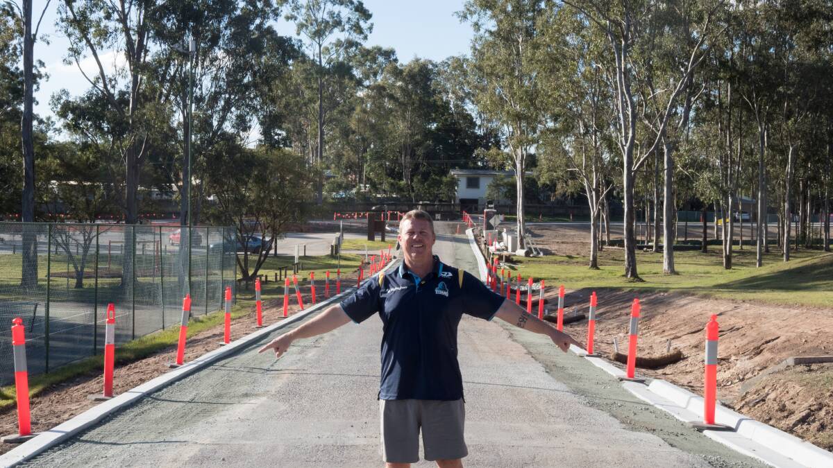 COMMUNITY INFRASTRUCTURE: Councillor Scott Bannan shows off the progress made in widening the driveway at Jimboomba Sports Park. Picture: Joe Colbrook.