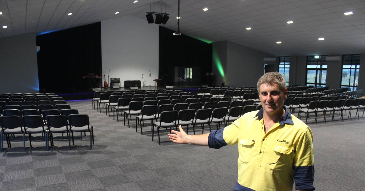New beginning: Harvest Point Church pastor Mark Ironside inside the new auditorium which is double the size of the previous building and seats 400 people.