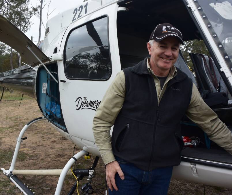 PRECISION FLYING: Helicopter pilot John Caldwell lands to refuel between power line stringing operations on Camp Cable Road. Photo: Christine Rossouw