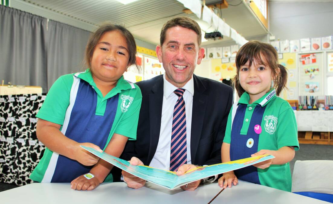 SEEING THEIR POTENTIAL: Minister Cameron Dick with prep students Amelia Schaenzel and Maddox Leapai. Photo: Supplied