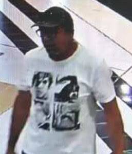An image released by police of the man they wish to speak to regarding suspicious activity at a shopping centre in Browns Plains on April 16.