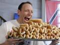 Joey 'Jaws' Chestnut was ruled out of a hot dog eating contest over his contract with a rival brand. (AP PHOTO)