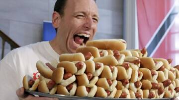 Joey 'Jaws' Chestnut was ruled out of a hot dog eating contest over his contract with a rival brand. (AP PHOTO)