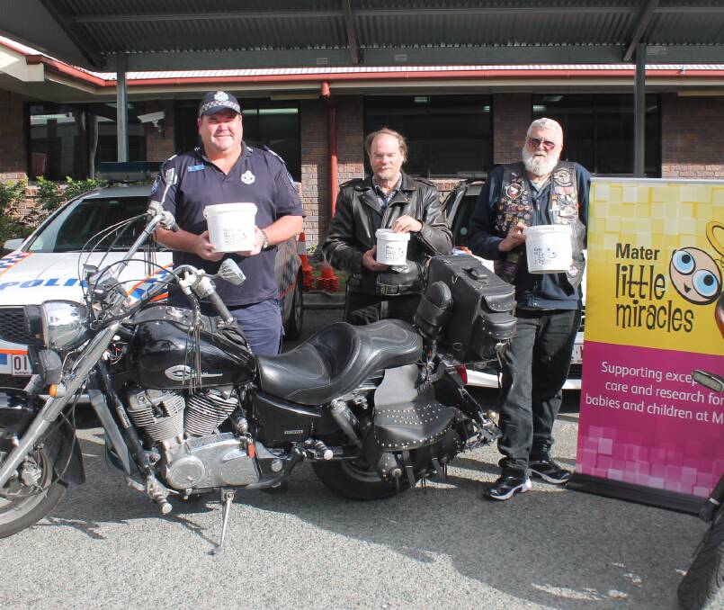 WALK: Sergeant Terry Armstrong with Mount Lindesay Ulysses riders Darryl 'Shadowrider' Arnold and Wayne 'Grizzly' McCormack. Photo: Georgina Bayly