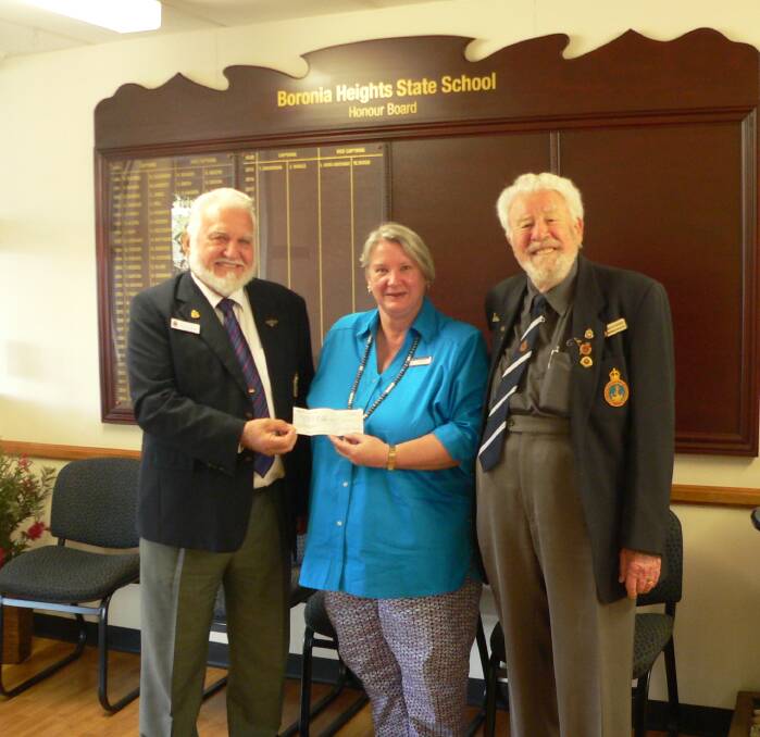 CHEQUE: Greenbank RSL sub-branch president Gary Aldridge, Boronia Heights State School principal Sue Clark and vice-president of the Greenbank sub-section of the Naval Association of Australia. Brian J. Berry. Photo: Supplied